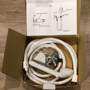 Hand held shower sprayer open box never used with instructions